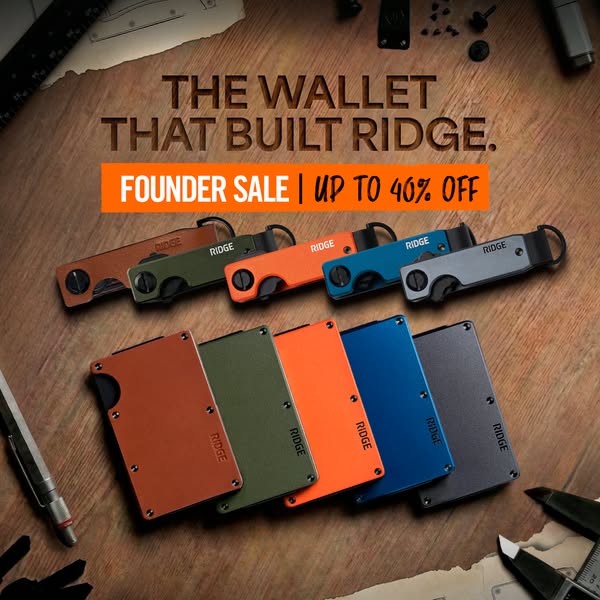 This image ad for Ridge wallets features a variety of wallets in different colors, laid out on a wooden surface with var