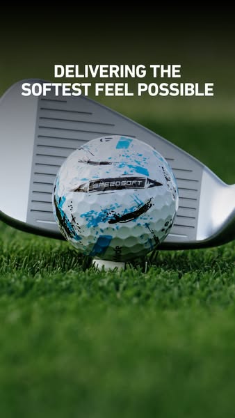 This ad features a close-up of a SpeedSoft golf ball sitting on a tee in lush green grass, poised behind a golf club. Th