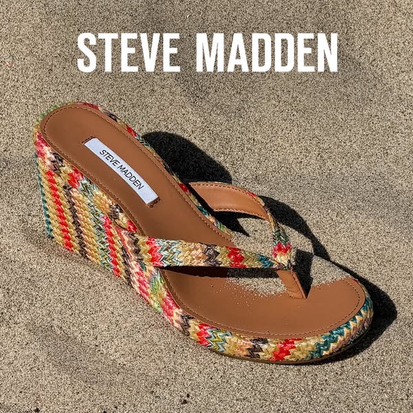 This Steve Madden ad features a single wedge sandal on a sand background. The brand name is displayed in large text abov