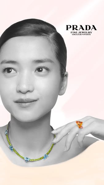 This ad showcases Prada's fine jewelry collection, highlighting a necklace and ring worn by a model against a soft, 