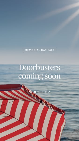An Ashley ad promoting their Memorial Day sale with the text, "Doorbusters coming soon." It features a partial