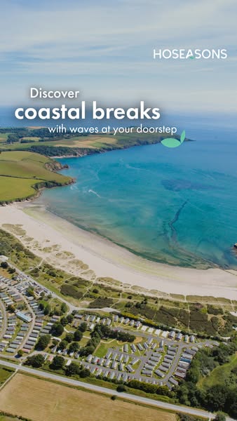 The image ad showcases an aerial view of a coastal resort, inviting viewers to discover coastal breaks with waves at the