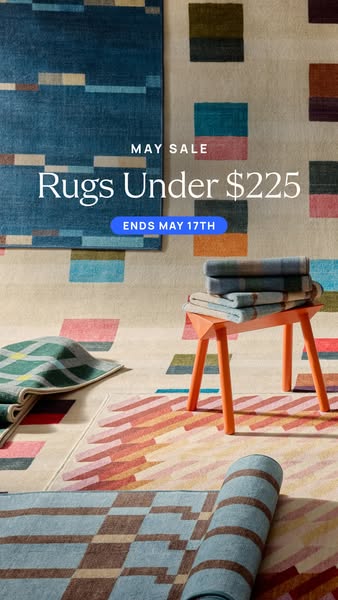 This image ad promotes a May sale on rugs, featuring a variety of colorful, patterned rugs in an indoor setting.