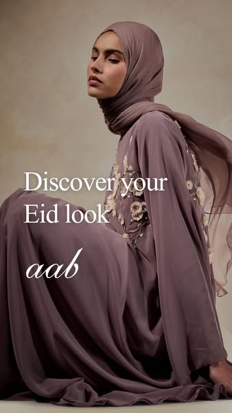 This image ad showcases a model wearing a brown dress and hijab from AAB, with text overlayed to promote 'Discoverin