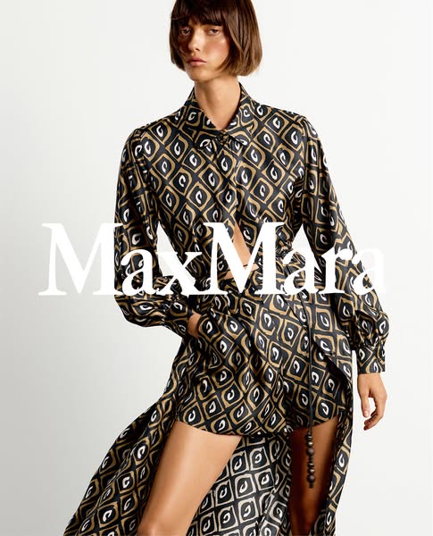 This image ad showcases a woman wearing a Max Mara patterned outfit, featuring a top and shorts with a matching long ski