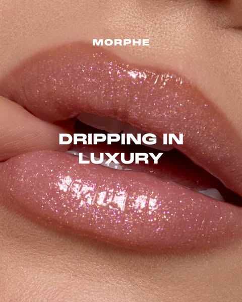 This ad showcases a close-up of lips covered in Morphe lip gloss. The visual is simple and focuses all attention on the 