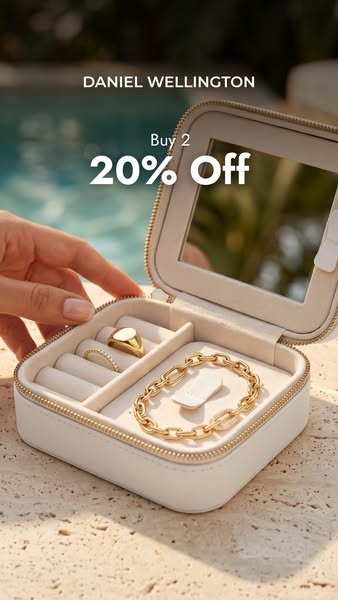 This Daniel Wellington image ad promotes a sale on jewelry, featuring a woman's hand near an open jewelry case that 