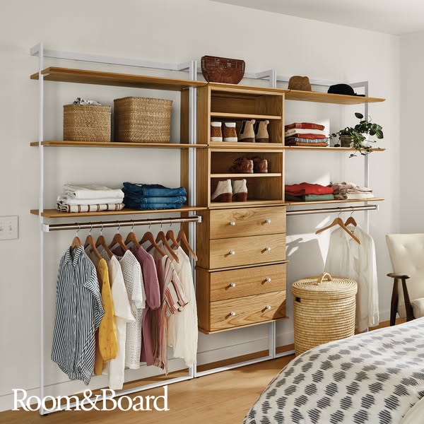 This ad showcases a closet organization system from Room & Board, highlighting its design and functionality within a