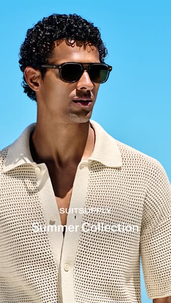 This ad features a man in a cream-colored cardigan and sunglasses, set against a blue sky background. The ad promotes Su