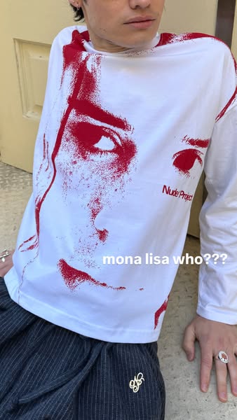 This ad features a person wearing a white long-sleeve shirt with a red graphic of a face and the brand name 'Nude Pr