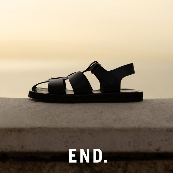 This ad features a single image of black sandals shot at eye level, promoting the brand END.