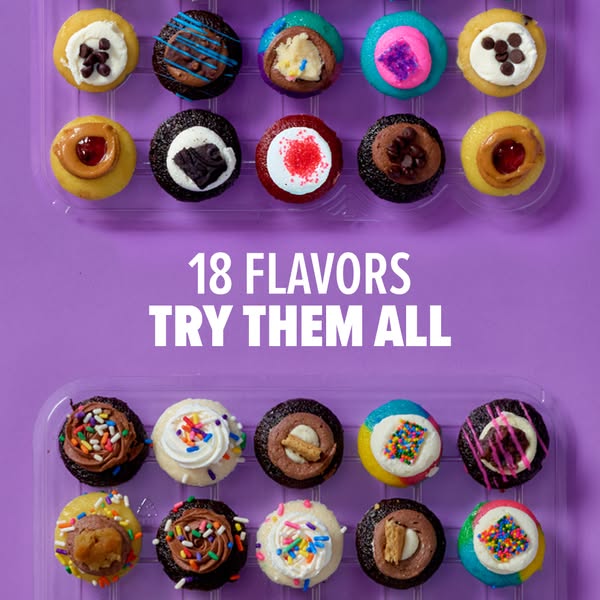 The image ad features 18 cupcakes, each with different flavors and toppings, arranged in a clear plastic container again