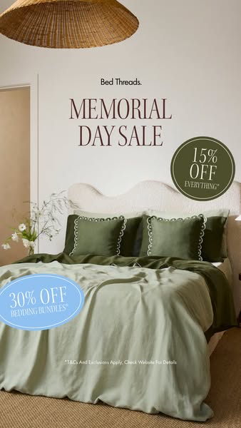 An image ad for Bed Threads, featuring a bed with green bedding and pillows. The ad promotes a Memorial Day sale with di