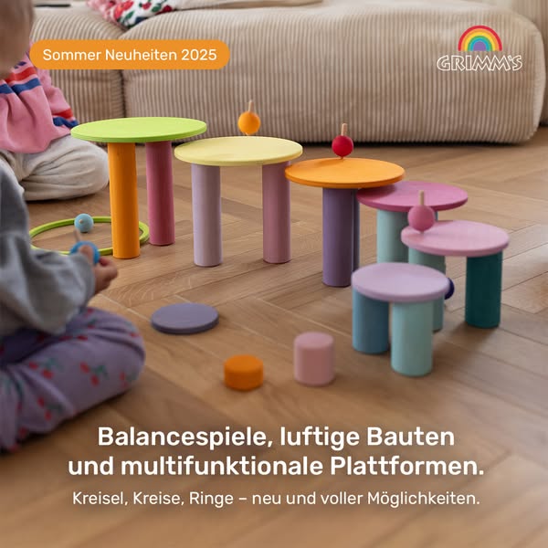 This Grimm's ad showcases a set of colorful wooden toy building blocks, promoting them as balance games, airy struct