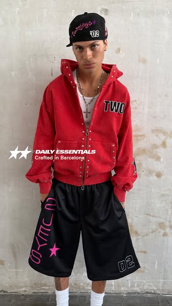 This ad showcases a male model wearing apparel by Twojeys, including a hat, hoodie, and shorts. The ad emphasizes the br