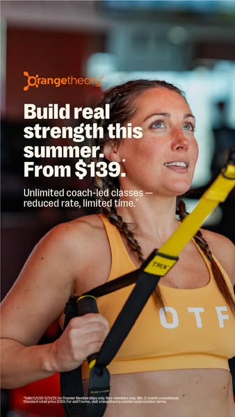 This image ad for Orangetheory Fitness features a woman in workout clothes holding onto a suspension trainer. The ad enc