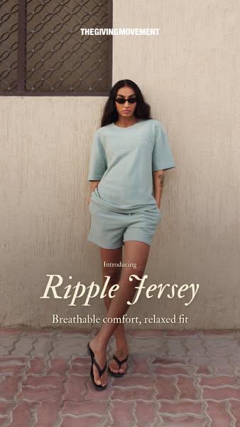 This ad for The Giving Movement features a woman wearing a matching aqua-colored jersey t-shirt and shorts set. The ad h