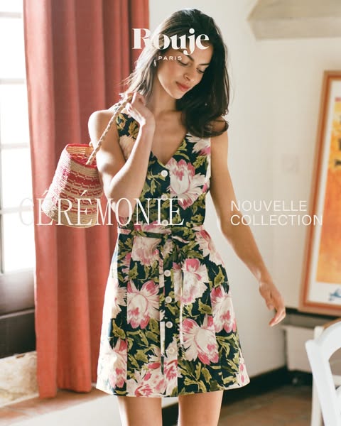 A lifestyle product photo featuring a woman wearing a floral dress from Rouje Paris. The image promotes the new collecti