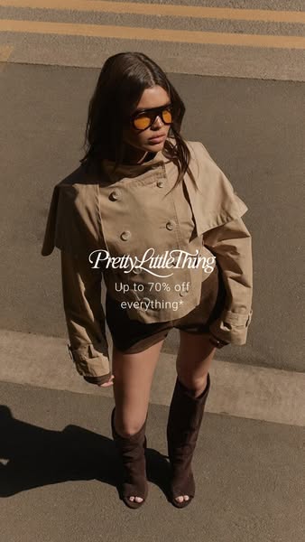 This ad features a brand shot of a woman wearing a jacket and boots from PrettyLittleThing. There is text laid over the 