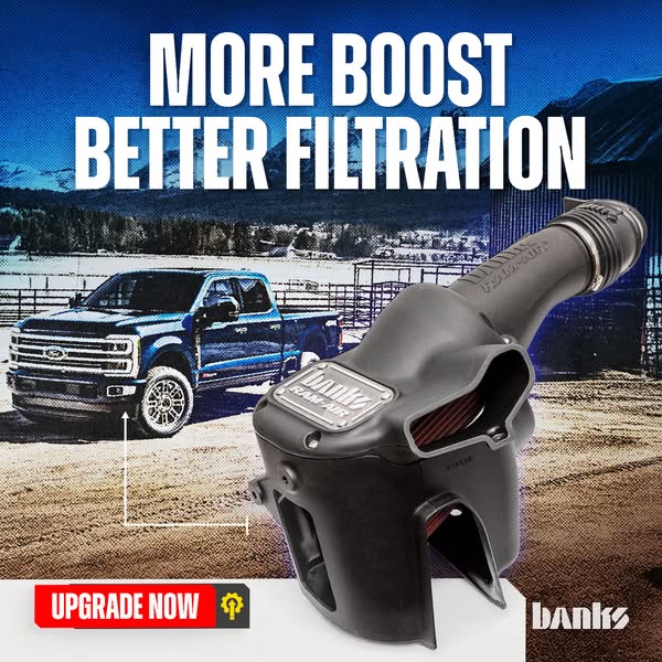 This image ad promotes Banks Ram-Air, an aftermarket air intake system for trucks. The ad highlights the product's a