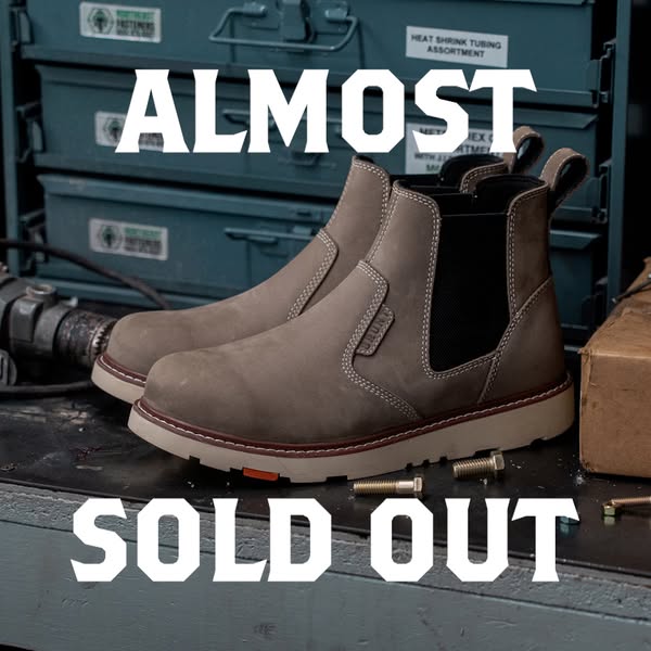 An image ad for a pair of brown work boots with a white sans-serif font overlay, that says "ALMOST SOLD OUT".