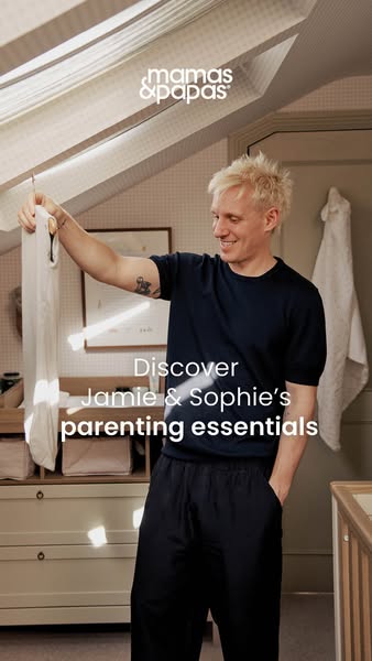 An ad featuring Jamie and Sophie's parenting essentials. The ad features Jamie holding up a white garment.