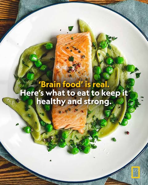 This ad promotes brain food by showing a plate of food with salmon, pasta, and peas.