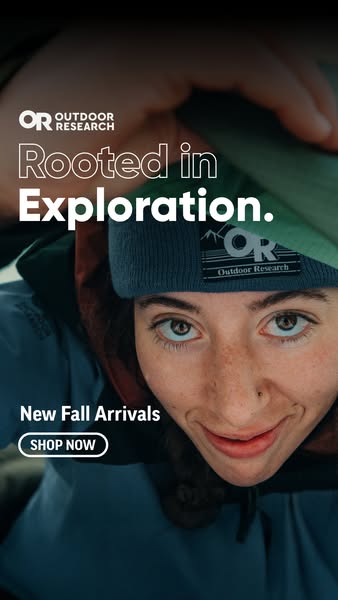 This image ad for Outdoor Research features a close-up shot of a person wearing Outdoor Research apparel, emphasizing th