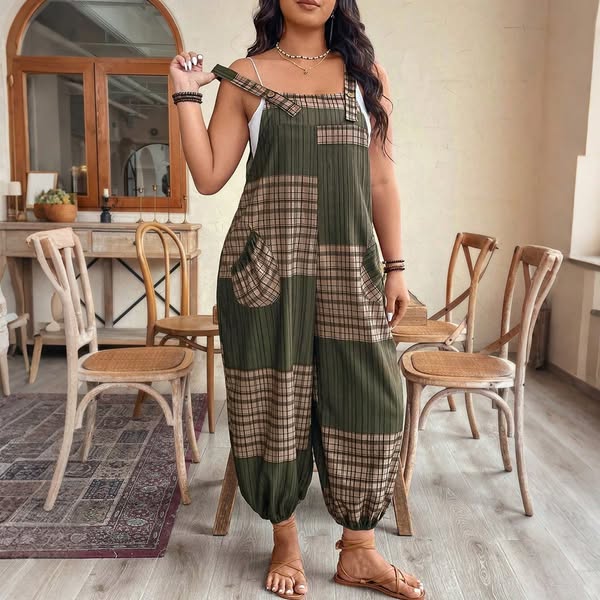 A woman models a patchwork, oversized jumpsuit. The background suggests a domestic setting.