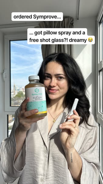 This ad features a woman showing the Symprove daily gut health drink that she ordered, plus a pillow spray, as well as a