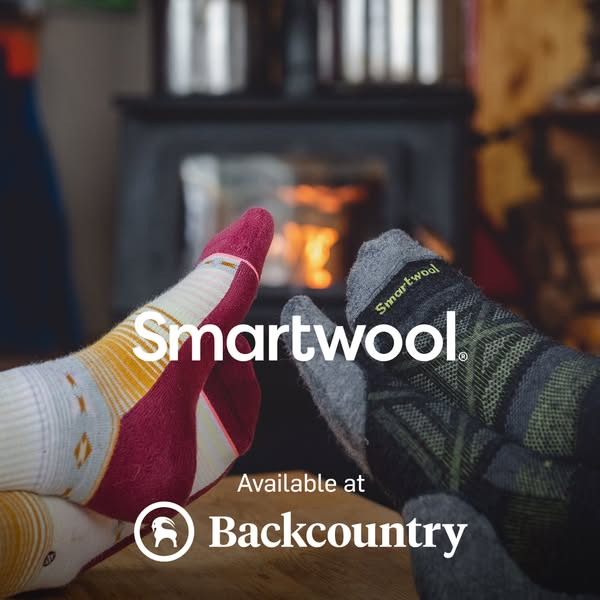 This ad features two people relaxing in front of a fireplace while wearing Smartwool socks. The ad promotes the comfort 