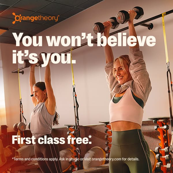 The ad features a photo of two women in a gym setting lifting weights and smiling, accompanied by the text "You won