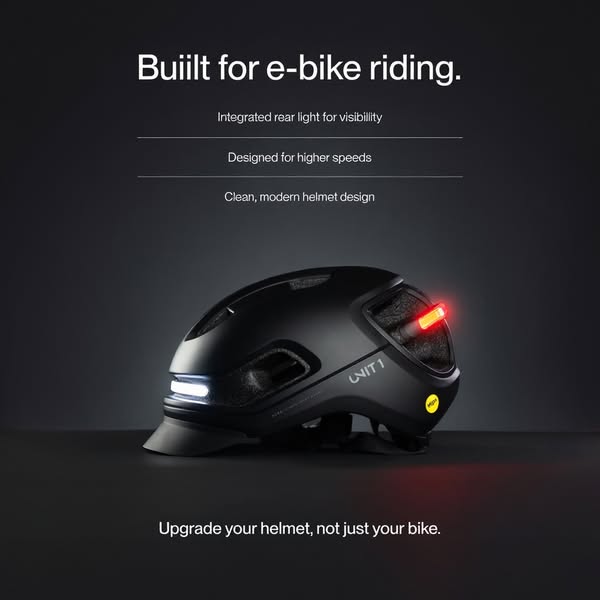 An image ad promoting the Unit 1 cycling helmet. The ad highlights the helmet's features, including an integrated re