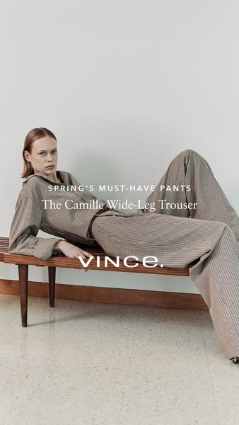 This ad showcases Vince's Camille Wide-Leg Trouser as a spring essential. The ad features a model lounging on a benc