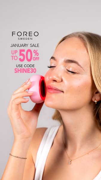 This ad for Foreo features a woman using the product on her face, along with a January sale offer.