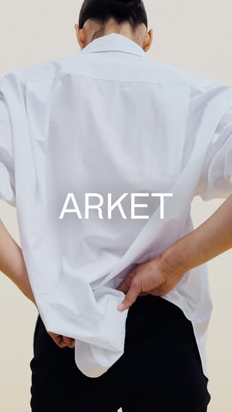 This ad features a person from the back wearing a white button-down shirt. It appears to be an ad from ARKET.