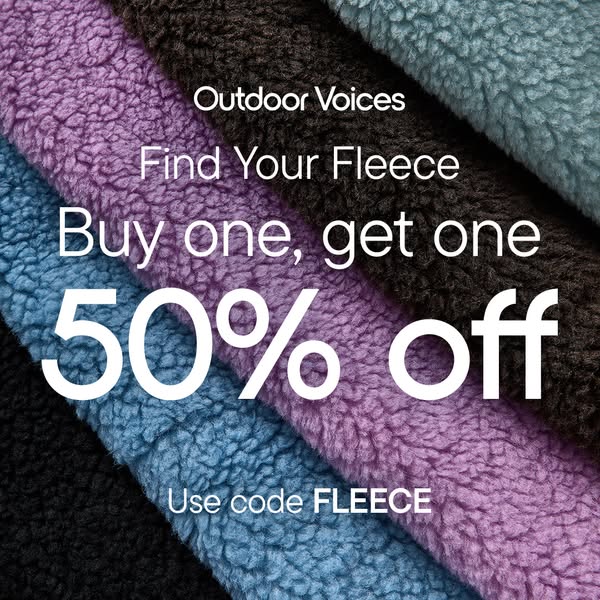 This image ad for Outdoor Voices promotes a buy-one-get-one 50% off deal on fleece items. The ad features a close-up sho