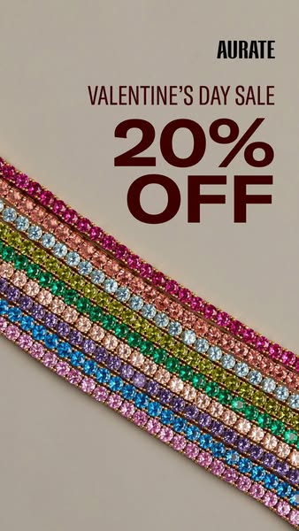 This Aurate image ad promotes a Valentine's Day sale with 20% off. The image features a close-up of colorful rhinest