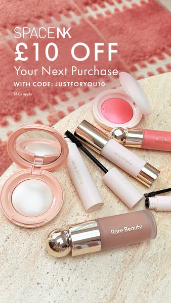 This image ad promotes Space NK and Rare Beauty. The ad features a selection of Rare Beauty makeup products and highligh