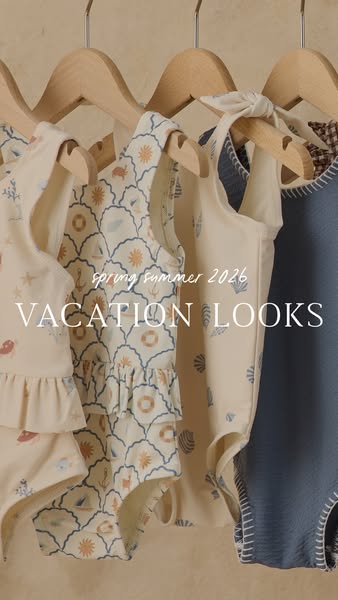 The ad displays a row of children's clothing items hanging on wooden hangers against a neutral backdrop. A caption a