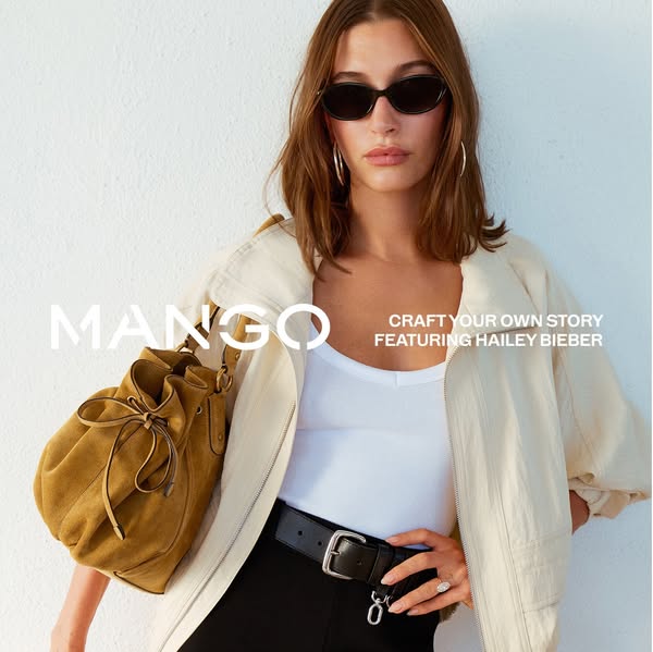 This ad showcases a tan suede purse from Mango, worn by model Hailey Bieber. It features a neutral color palette and min