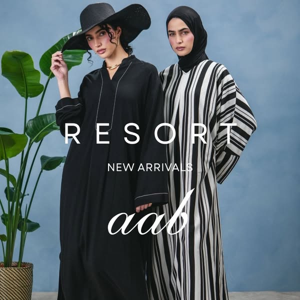 This image ad showcases new arrivals from the brand Aab's Resort collection. Two models stand side-by-side wearing t