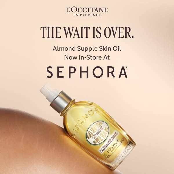 This ad announces that L'Occitane's Almond Supple Skin Oil is now available in Sephora stores. The ad features a
