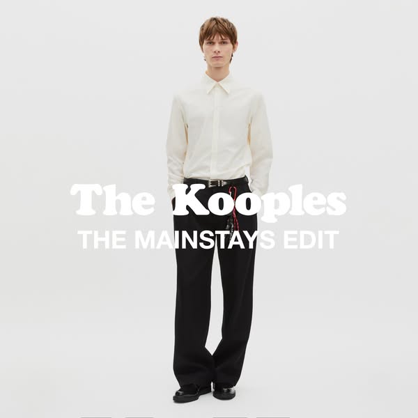 This ad showcases a man wearing clothes sold by The Kooples. The ad emphasizes the 'Mainstays Edit' collection. 