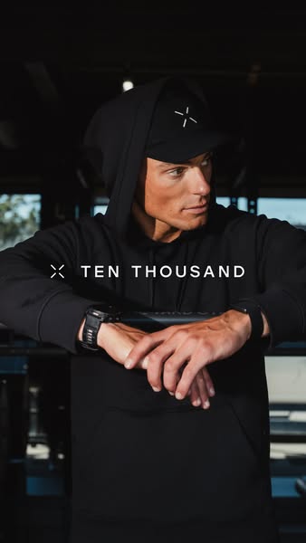 An ad for Ten Thousand fitness apparel. The ad shows a man wearing Ten Thousand branded apparel.