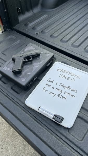 An image ad showcasing a promotion. It features a handgun and a container for it next to a whiteboard sign. The sign pro