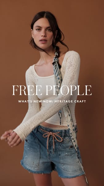 This image ad for Free People features a model wearing a long-sleeved shirt and denim shorts. The ad highlights new arri