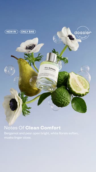 This ad presents Dossier's Airy Linens perfume. It features the bottle of perfume surrounded by the fragrance notes 