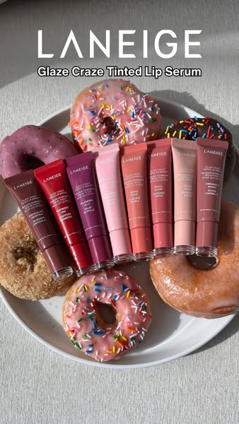 This ad showcases Laneige's Glaze Craze Tinted Lip Serum collection in a visually appealing arrangement. Seven tubes