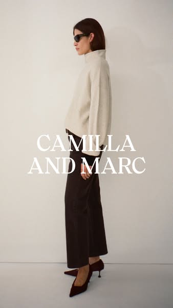 An ad for Camilla and Marc features a model in a sweater and trousers, styled with sunglasses and kitten heels. The ad s